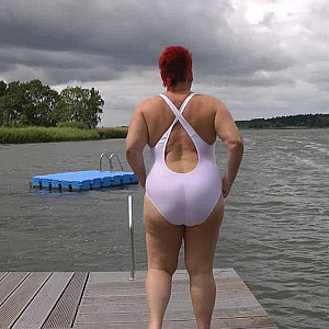 In WHITE SWIMSUIT in the lake gallery image