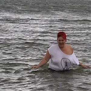 With RIPPED JEANS into the lake gallery image