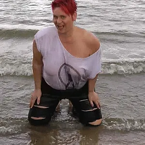 With RIPPED JEANS into the lake gallery image