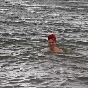 With RIPPED JEANS into the lake gallery image