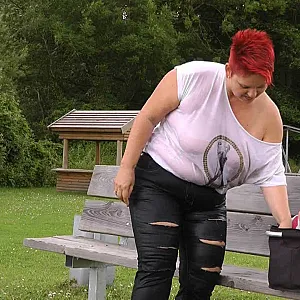 With RIPPED JEANS into the lake gallery image