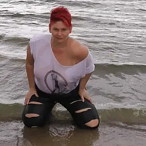 With RIPPED JEANS into the lake gallery image