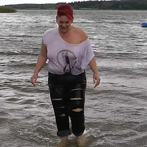 With RIPPED JEANS into the lake gallery image