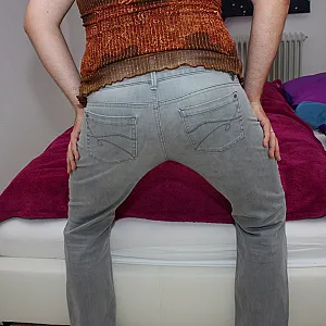 in top and jeans gallery image
