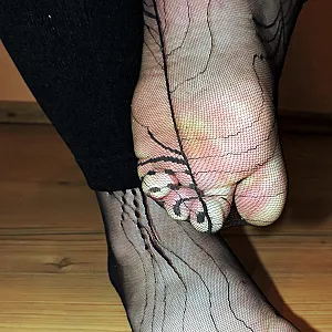 Hot in schwarz mit Mules und Spitzennylons Galeriebild