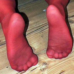 in red at the christmas tree gallery image