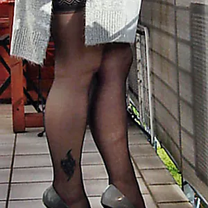 Mature Milf on balcony gallery image