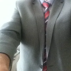 In suit and without gallery image