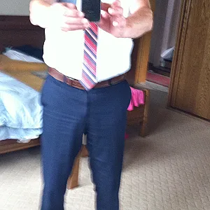 In suit and without gallery image