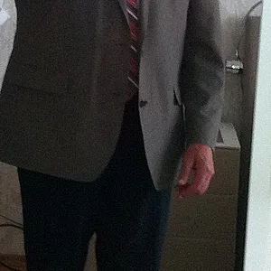 In suit and without gallery image