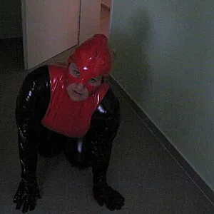 Petplay in latex suit ... gallery image