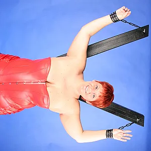 In red fetish outfit gallery image