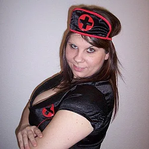 sexy nurse with xxxl Tits gallery image