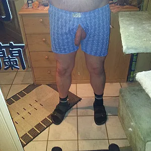 Cock sticking out of his pants gallery image