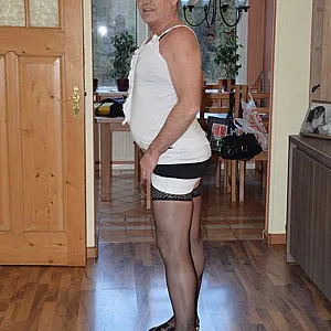 in female lingerie at home gallery image