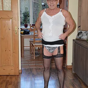 in female lingerie at home gallery image
