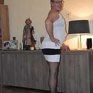 in female lingerie at home gallery image