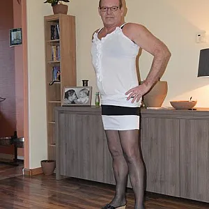 in female lingerie at home gallery image