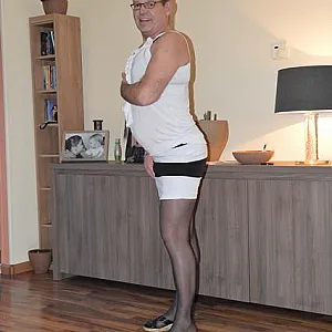 in female lingerie at home gallery image