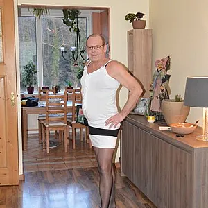 in female lingerie at home gallery image