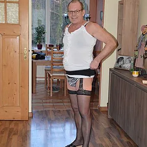 in female lingerie at home gallery image