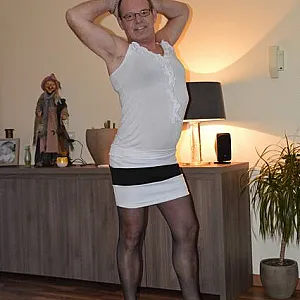 in female lingerie at home gallery image
