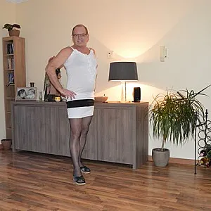 in female lingerie at home gallery image