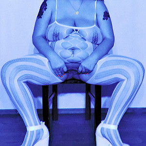 catsuit in blue light gallery image