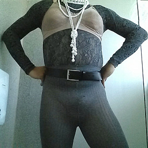 At work in ribbed pantyhose (ssh), bra and lace turtleneck sweater. Galeriebild