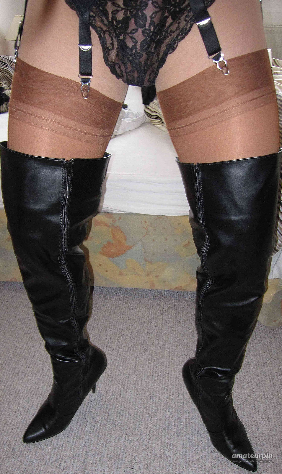 Crossdresser in Thigh-high Boots teases and cums on Nylons gallery image