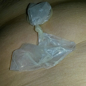 condom with sperm in gallery image