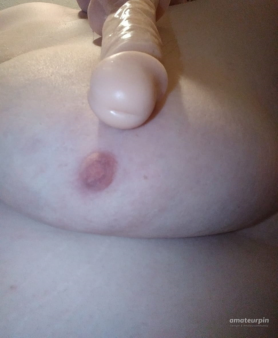 huge tits and a dildo gallery image