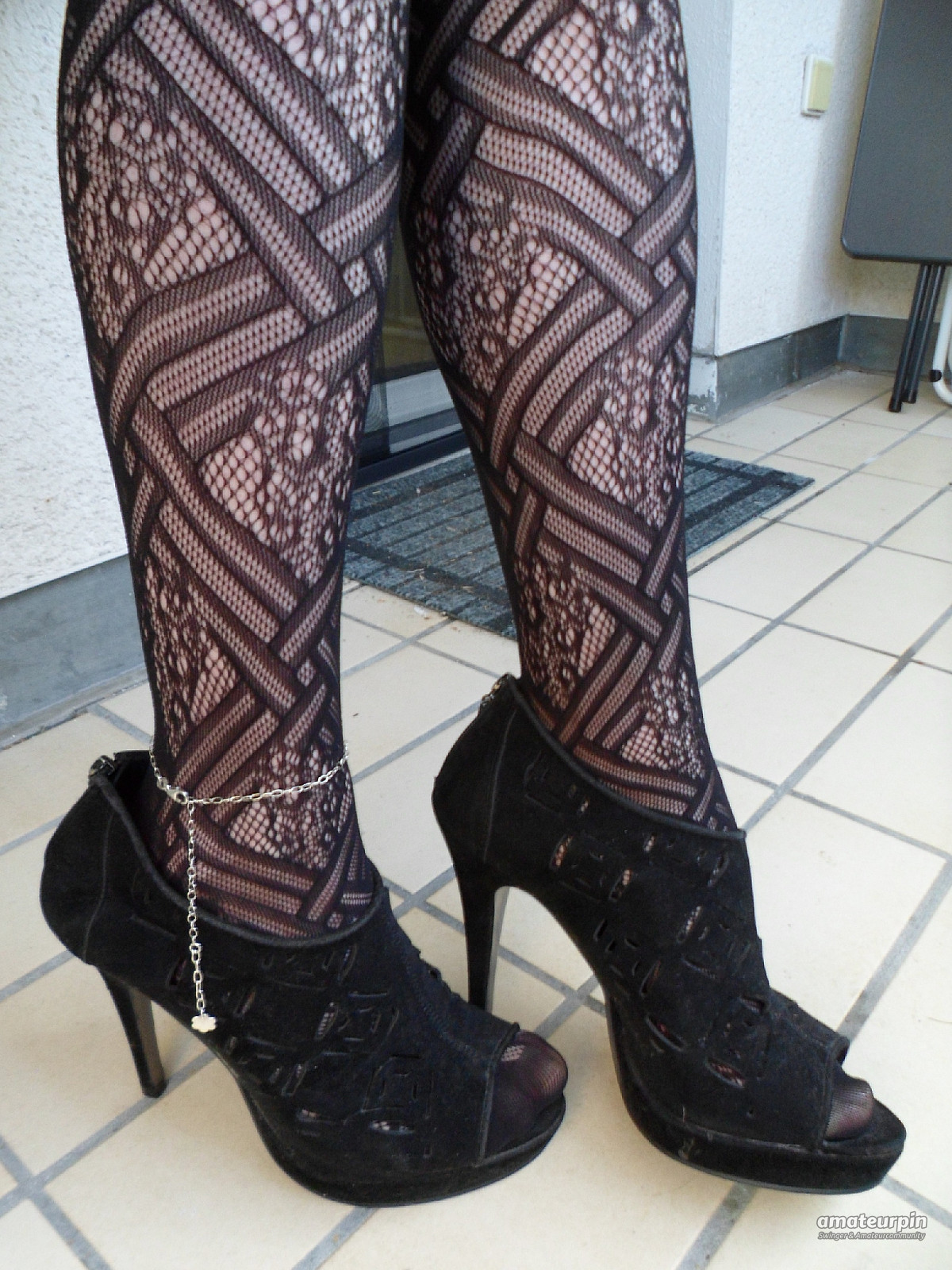 Fishnet tights and peep-toes gallery image