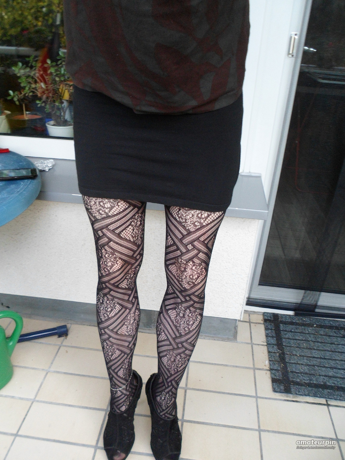 Fishnet tights and peep-toes gallery image