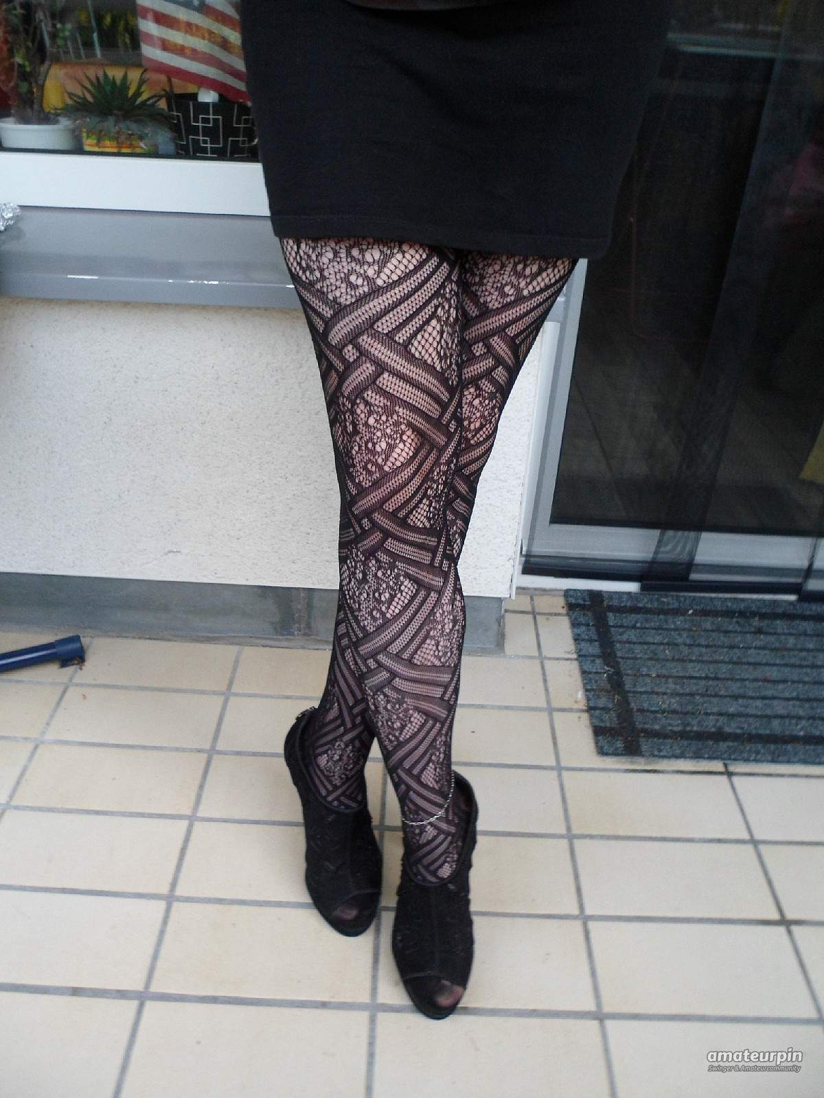 Fishnet tights and peep-toes gallery image