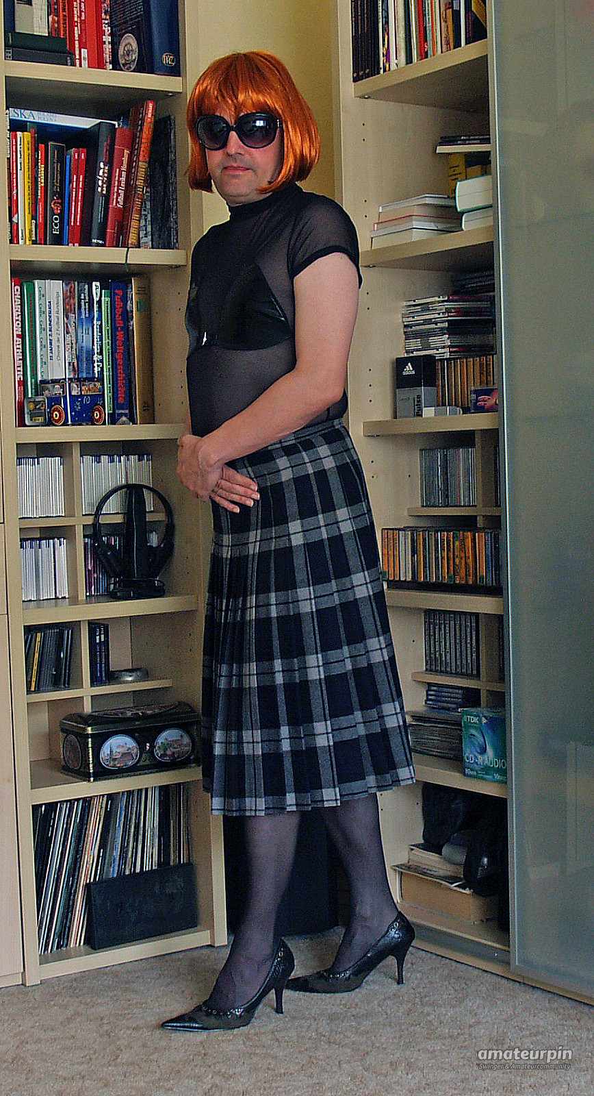 in a checkered skirt gallery image