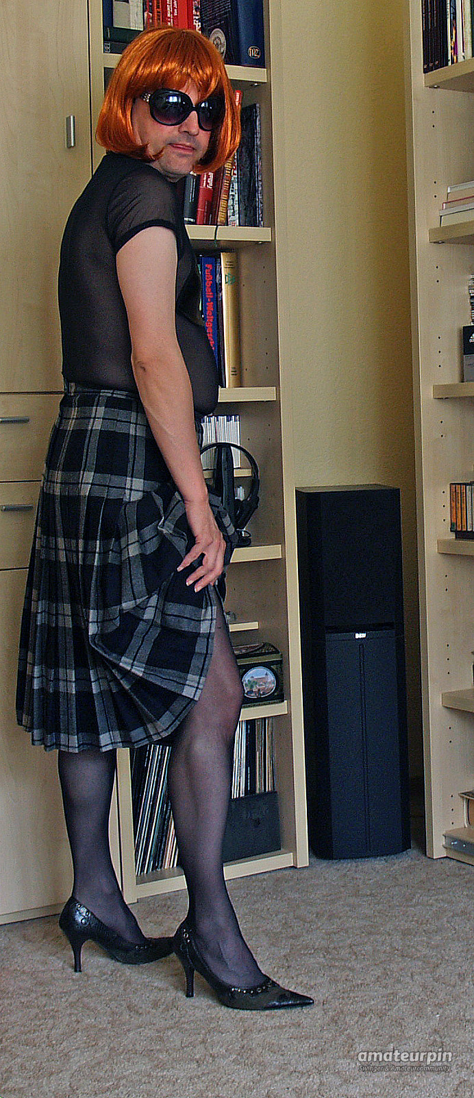 in a checkered skirt gallery image