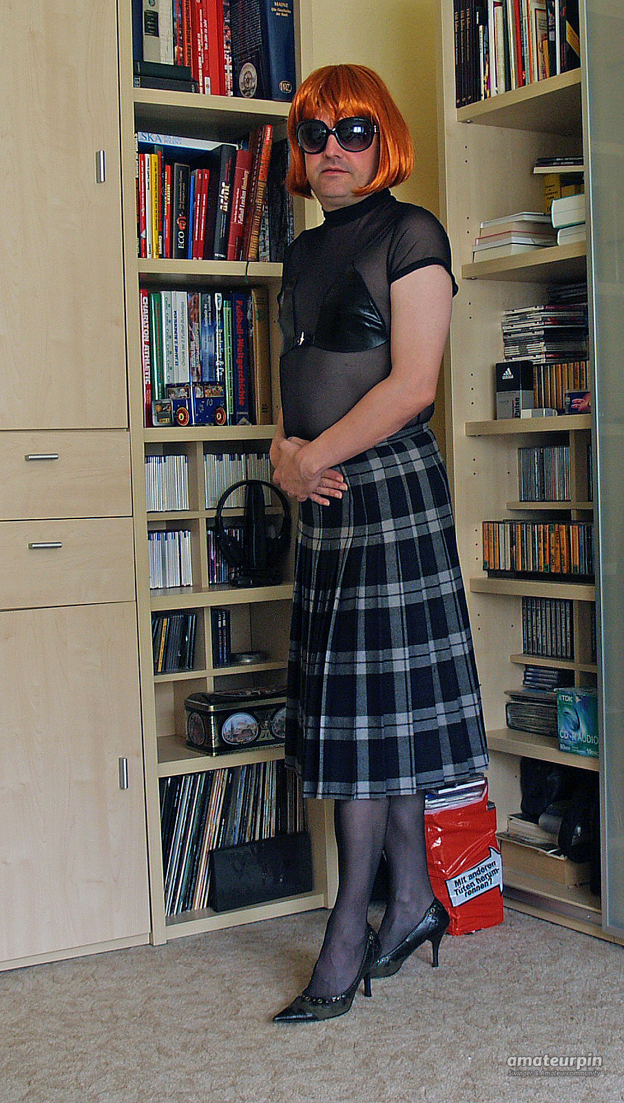 in a checkered skirt gallery image