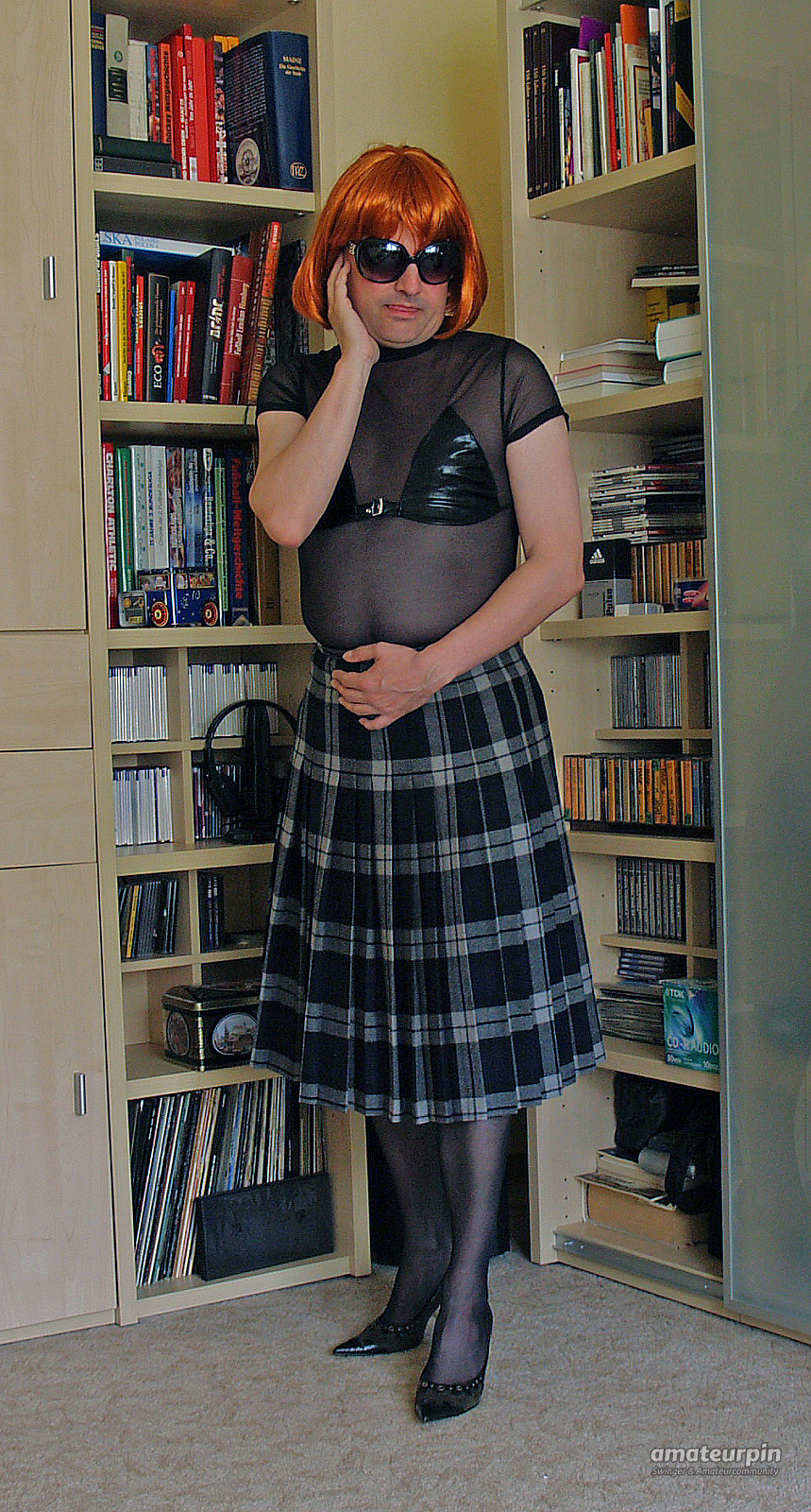 in a checkered skirt gallery image