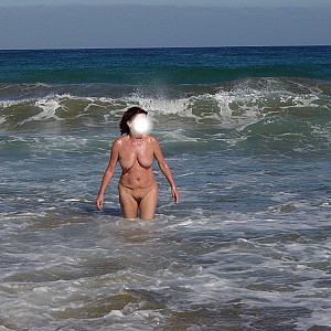 Naked in the waves gallery image