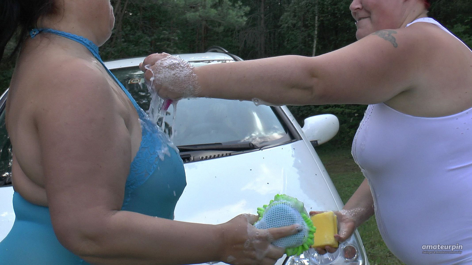 2 sexy lesbians wash car 1 gallery image