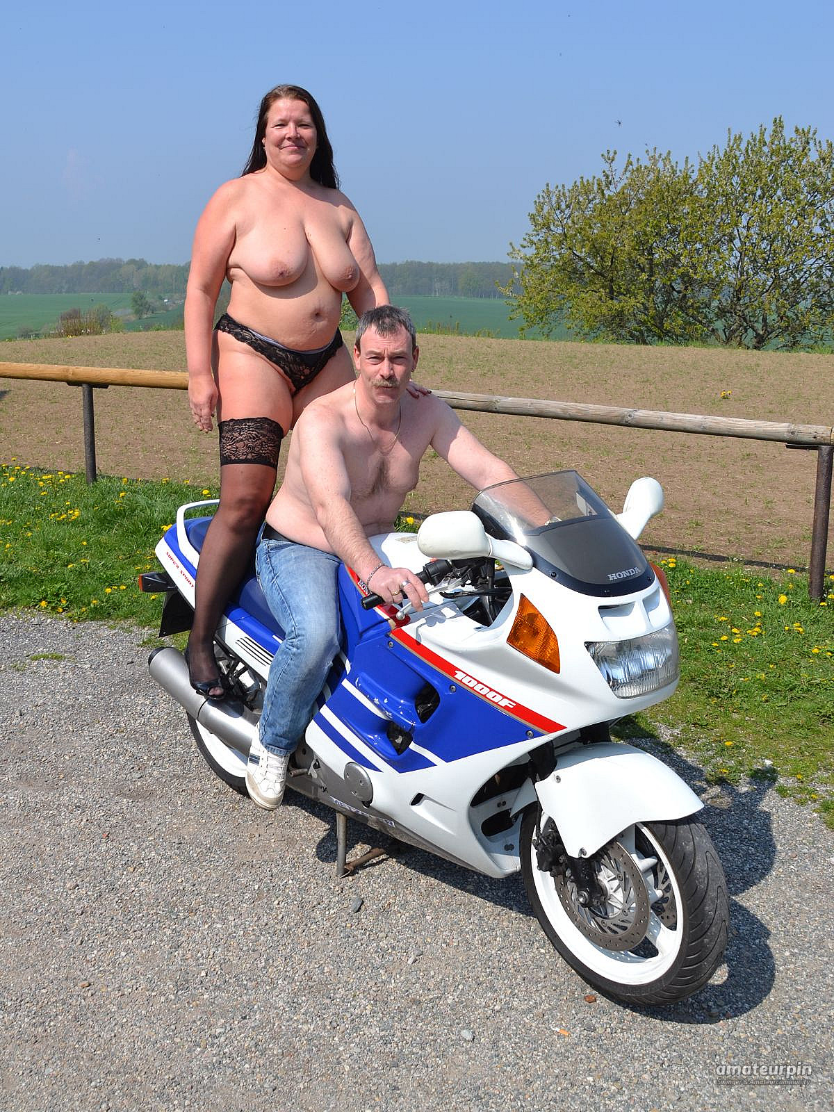 Topless on the bike 2 gallery image