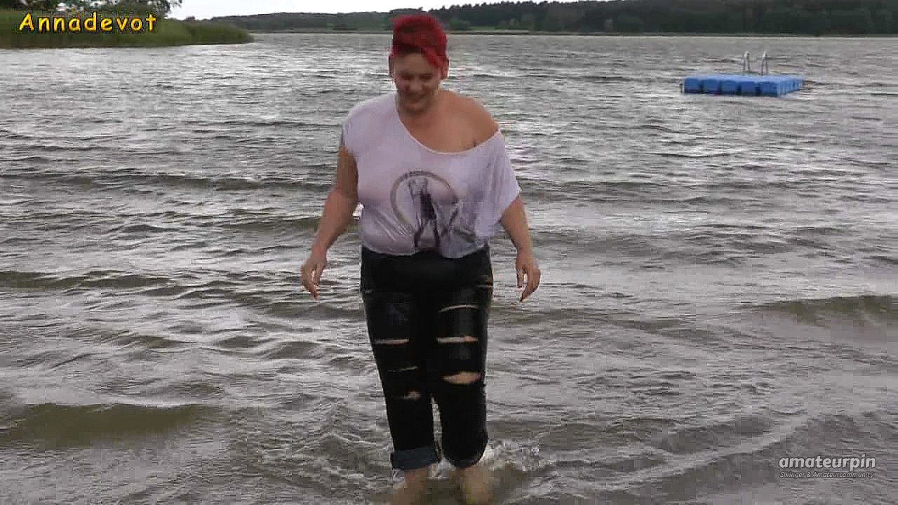 With RIPPED JEANS into the lake gallery image