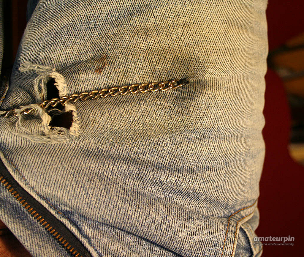 Jeans with a chain for the naked cock gallery image