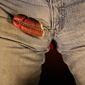 Jeans with a chain for the naked cock gallery image