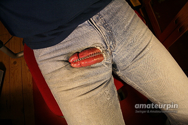 Jeans with a chain for the naked cock gallery image