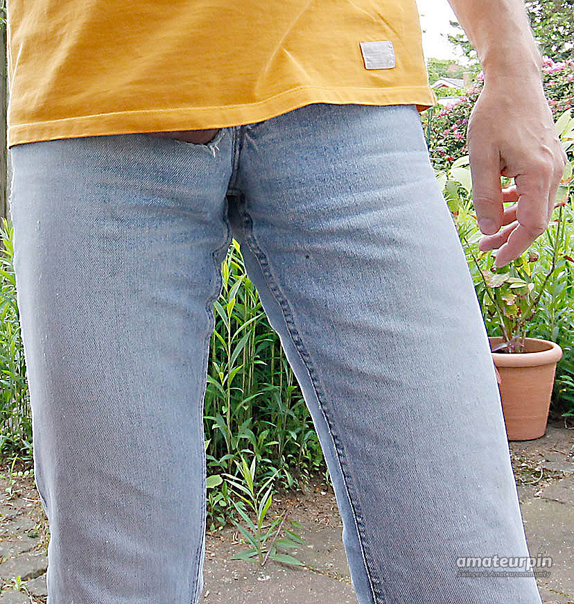 Jeans with a chain for the naked cock gallery image