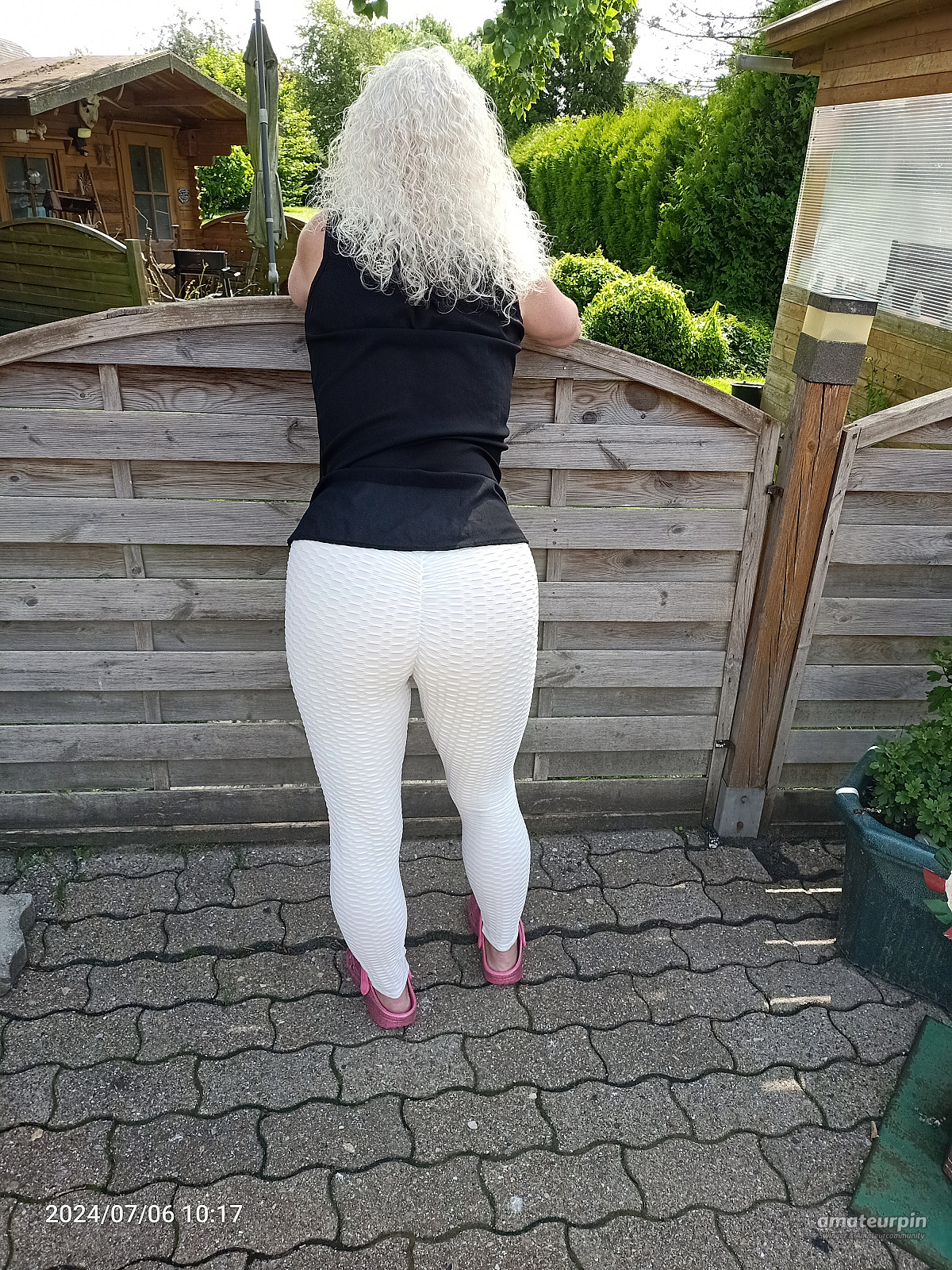 in leggings from behind gallery image