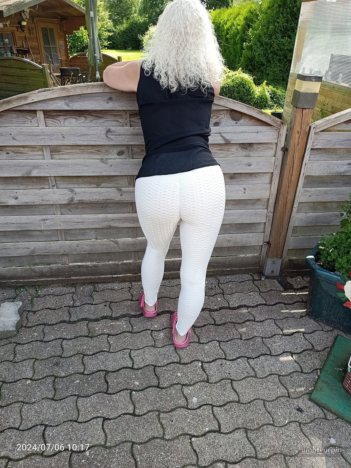 in leggings from behind gallery image