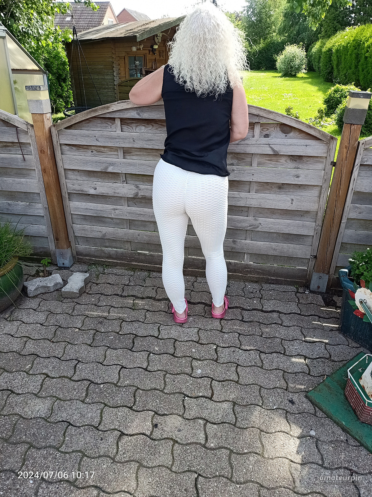 in leggings from behind gallery image